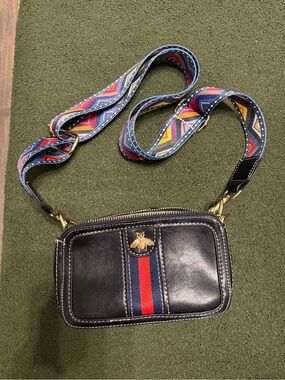 Leather Crossbody Bag with Bee Accent in Black and Red Stripe